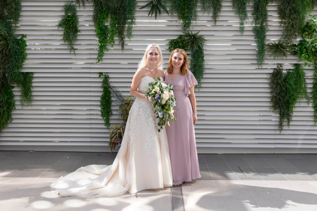 Bride and Bridesmaid on rooftop of Hotel La Tour