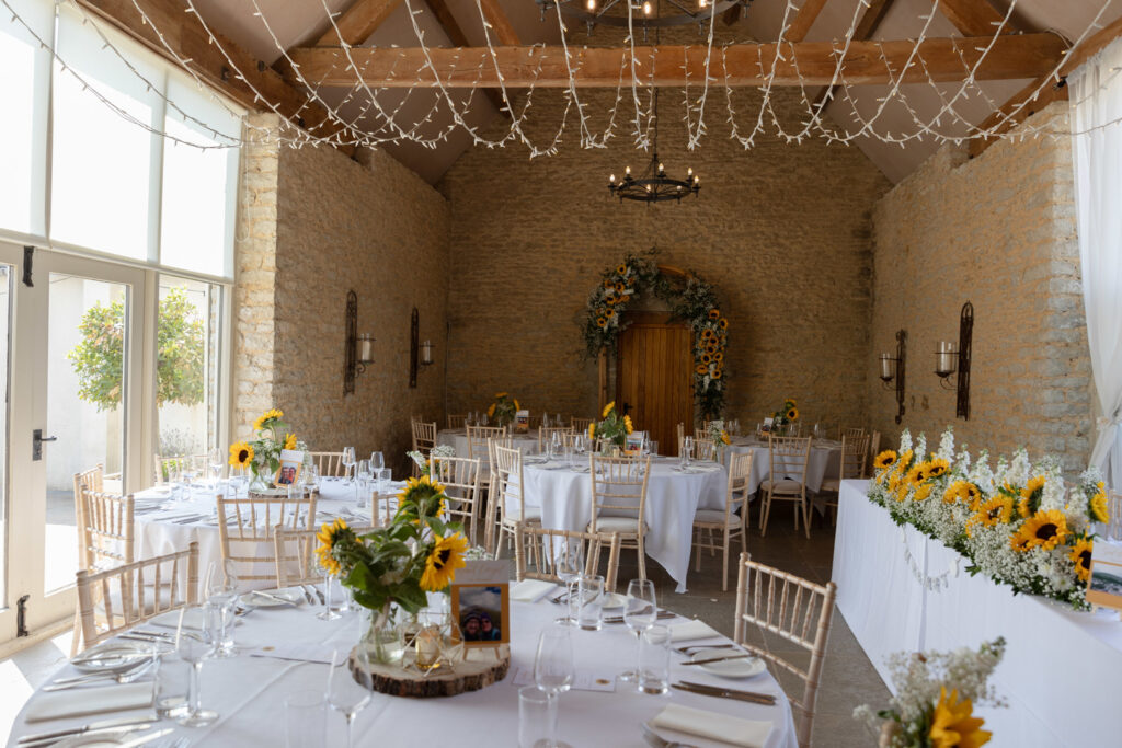 Wedding breakfast at Stratton court barn. Photography by Kirsty Cox Photography
